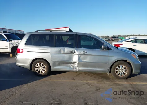 2010 Honda Odyssey Ex z USA, uszkodzony, nr VIN 5FNRL3H44AB037983